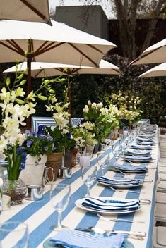 a long table with blue and white striped cloth