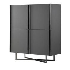 a black cabinet with three doors and metal legs