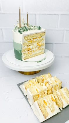 a slice of cake sitting on top of a plate next to another piece of cake