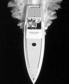 a motor boat is speeding through the water