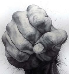 a black and white drawing of a fist