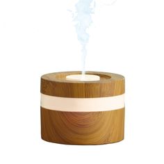 "Get the Yellow USB Color Changing Aromatic Diffuser by Ashland® at Michaels. com. You can use this color changing diffuser to fill your home with a sweet fragrance. You can use this color changing diffuser to fill your home with a sweet fragrance. Simply add your choice of essential oil into it and let the magic take over. Details: Yellow with wood-like finish 3.86\" x 2.83\" (9.804cm x 7.188cm) Includes 3 pieces For use with essential oils (not included) LED bulbs not replaceable Features 4 ti Sweet Fragrance, Fragrance Diffuser, Sweet Fragrances, Home Fragrance, Candle Decor, Essential Oil, Color Change, Led Bulb, The Magic