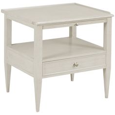 an end table with two drawers and one drawer on the bottom, sitting against a white background