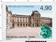 a stamp with the image of a building and trees on it's front side