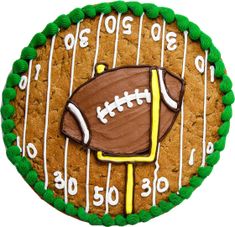 a decorated cookie with a football on it