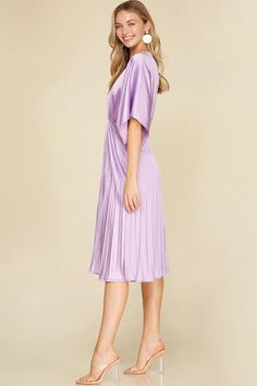 Introducing our Satin Cascade Midi Dress in a charming lilac hue, perfect for adding a touch of elegance to any occasion. This dress features kimono sleeves and luxurious satin fabric that drapes beautifully, complemented by a pleated skirt for a graceful silhouette. With a back zipper for easy wear, and elastic waistband, it's a stunning piece that effortlessly combines sophistication with timeless style. Size and Fit (measurements based on flat lay) Small: Waist 27" Length 44" Medium: Waist 29 Lilac Satin Dress, Exec Photoshoot, Lilac Midi Dress, Floral Dresses With Sleeves, Satin Dresses Long Sleeve, Dress With Sleeves, Kimono Sleeves, Lilac Dress, Dress Satin