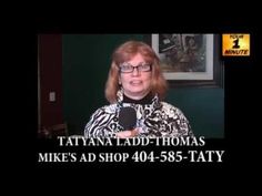 a woman holding a microphone in front of a black and white photo with the caption that reads, tattanan ladd - thomas mike's ad shop 40 - 45 - 58 - 65 - 55 -