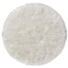 a white sheepskin rug on a white background