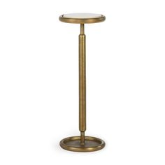 a gold pedestal with a glass top and metal base on an isolated white background photo