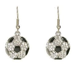 a pair of silver earrings with black and white stones