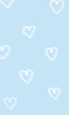 a blue background with white hearts on the left and right sides, all in different sizes