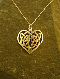 "The Celtic Knot Heart pendant is 14K Gold. The 14K Gold Chain as pictured is 18\". The Celtic heart pendant measures 1 1/8\" across by 1 1/16\" tall. I hand cast all my pieces using the lost wax casting method. Please ask your needs. You may call me with questions, often I am out so please use my machine. 831-476-3176. Satisfaction Guaranteed! This piece is made and ready to ship This piece ships USPS First Class Insured I send items USPS First Class unless otherwise directed. I send as soon as Celtic Heart Knot, Chain Gang, Heart Knot, Celtic Knot Designs, Celtic Heart, Wax Casting, Lost Wax Casting, Hand Cast, Lost Wax