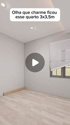 an empty room with white walls and wooden flooring is shown in the video below