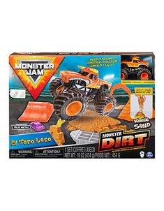 the monster jam playset is packed with sand and plastic construction equipment, including an orange truck