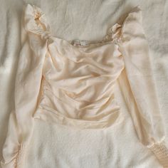 Great Condition Never Worn Just Took Tags Off Slightly Slim Fit, More Like An Xs Elegant Cropped Cream Top, Elegant Cream Cropped Tops, Spring Beige Ruched Top, Feminine Cropped Ruched Tops, Fitted Beige Ruched Top, Feminine Ruched Cropped Tops, Elegant Cream Crop Top For Spring, Elegant Beige Off-shoulder Top, Elegant Off-shoulder Beige Tops