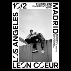 two people sitting on top of a metal wall with the words leon coeur below them