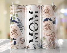 three different types of cans with flowers on them