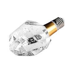 a diamond shaped object with a gold tip on it's end and a white background