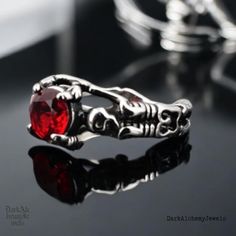 🔥 Steampunk Gothic Red Zircon Skull Open Ring for Men & Women 🔥 🔮 Looking for a bold statement piece? This Steampunk Gothic Red Zircon Skull Open Ring is designed for those who live life unapologetically! With a striking red zircon gem and a vintage metal skeleton design, this ring is the perfect blend of punk, hip hop, and gothic styles. 💀  Unique Skull Design Stand out with this intricately crafted skeleton ring that captures the dark elegance of gothic fashion. Red Zircon Sparkle The deep Edgy Skull Ring For Halloween Gift, Edgy Skull Ring For Halloween, Gothic Metal Skull Ring As Promise Ring, Gothic Metal Skull Ring For Promise, Gothic Stainless Steel Skull Ring, Male Ring, Metal Skeleton, Skeleton Ring, Dark Elegance