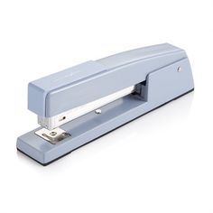 a stapler that is sitting on top of a white surface with the handle extended