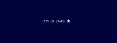 the city of stars logo on a dark blue background