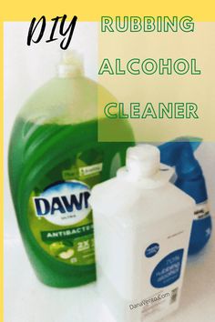 a bottle of alcohol next to a container of detergent on a white surface with the words diy rubbing alcohol cleaner