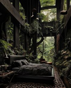 a bed sitting in the middle of a forest filled with lots of trees and plants