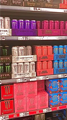 the shelves are filled with different types of cans and boxes for sale in a store