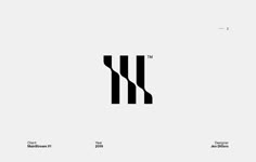 the letter m is made up of black and white stripes