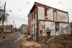 an old run down building with graffiti on it