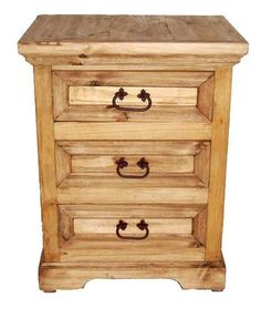 a small wooden chest with three drawers