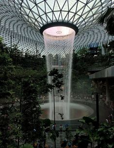 the inside of a building with a fountain