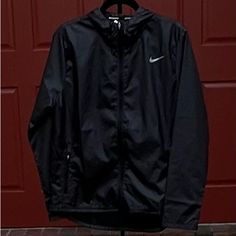 The Nike Essential Running Jacket Helps You Keep Running When Wet Weather Arrives. Water-Repellent Fabric Combines With Hooded Coverage To Help You Stay Dry For Miles. Nike Black Outerwear For Work, Black Nike Outerwear For Work, Nike Rain Jacket, Womens Running Jacket, Running Jacket, Wet Weather, Water Repellent Fabric, Running Women, Black Nikes