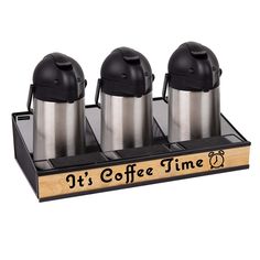 three coffee mugs sitting on top of a wooden holder with the words it's coffee time