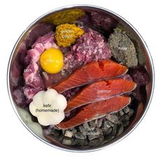 an image of fish and other foods in a bowl with labels on the side that describe their ingredients