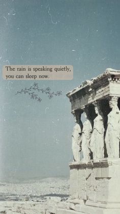 an old photo with some statues and a quote on the side that says, the rain is speaking quietly you can sleep now