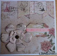 a close up of a greeting card with flowers and buntings on the side