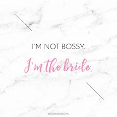 the words i'm not bossy, i'm the bride on a marble background