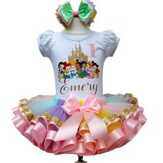 I offer you a beautiful birthday tutu outfit girls. NOTES FOR THE SELLER -Number for personalizing the top. -Name to personalize the vertex. -Need by date. Sleeve for the top - short, long. TOP. The top of it is 100% cotton. Size 3-24 months it is a bodysuit, 2T-10T it is a shirt. (Since it is more handmade always remember the shirt needs to be washed inside out, hand washed and air dried). SKIRT - made of soft tulle, edged at the bottom with a ribbon and decorated with a bow. Tutu is planted on Easter Birthday Ruffled Tutu Dress, Easter Princess Tutu Dress For Dress-up, Multicolor Princess Tutu Dress For Cake Smash, Princess Style Easter Tutu Dress For Dress-up, Easter Princess Style Tutu Dress, Princess Dress For First Birthday Easter, Fitted Tutu Dress For Birthday And Easter, Fitted Tutu Dress For Easter Birthday, Princess Birthday Dress For Easter