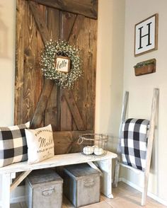 the entryway is decorated with black and white plaid pillows