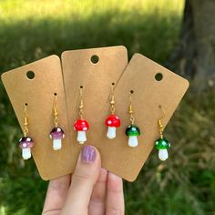 Glass blown mushroom charms on hypoallergenic hooks. Small Mushroom, Mushroom Earrings, Lightning Bolt Earrings, Bee Charms, Small Gift Boxes, Earring Cards, Green Item, Pink Turquoise, Girls Earrings