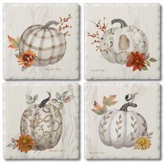 four coasters with pumpkins and flowers on them