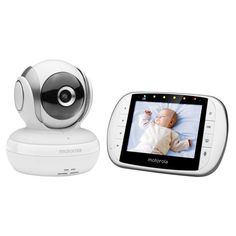 the motorola baby monitor is on display next to it's own digital camera,