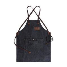 a black apron with brown straps and two pockets on the front, one pocket is open