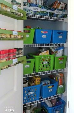 an organized pantry with bins and baskets