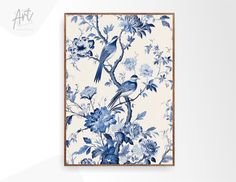 a blue and white floral wall hanging with two birds on the branch, surrounded by flowers