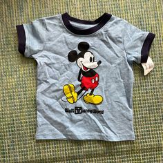 Nwt Disney Parks Vintage Style Crew Neck Blue And Navy Mickey Tee Size 12. Mickey Romper Also Listed Vintage Disney Shirts, Vintage Mickey Mouse Shirt, Retro Mickey Mouse Short Sleeve Tops, Disney Baby Tee, Y2k Fall, Blue Mickey Mouse T-shirt, Mickey Mouse Graphic Cotton Tee, Blue Mickey Mouse Crew Neck T-shirt, Blue Mickey Mouse Playful T-shirt