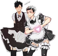 two people dressed in maid outfits one holding a heart