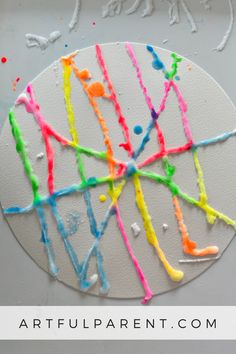 this is an art project for kids that uses melted paint and glue to create the shape of a circle