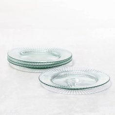 two green glass plates sitting next to each other